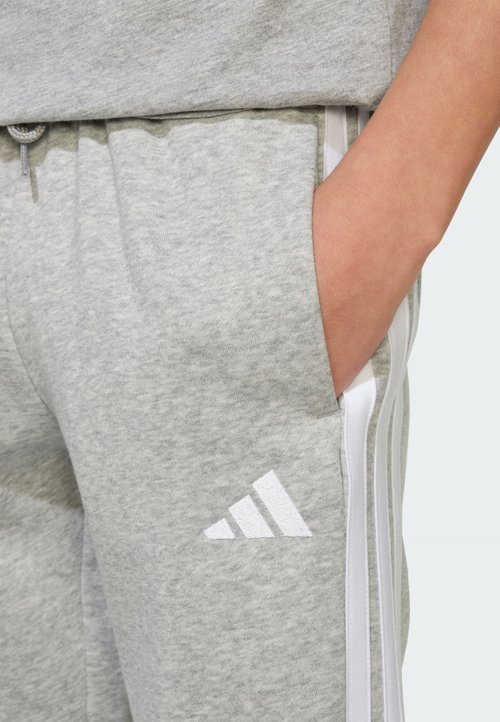 adidas JUNIOR UNISEX - Tracksuit bottoms - medium grey heather/white — foto 4