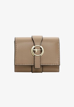 Compact beige leather wallet with a circular gold hardware accent, stitched edges, and a flap closure. Features a smooth texture and rectangular shape.
