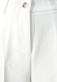 Modström GALE PANTS - Kelnės - soft white
