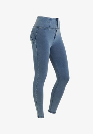 Leggings en denim bleu avec une taille haute, une fermeture éclair à l'avant et une poche latérale. Présentent une texture lisse et une coupe ajustée.