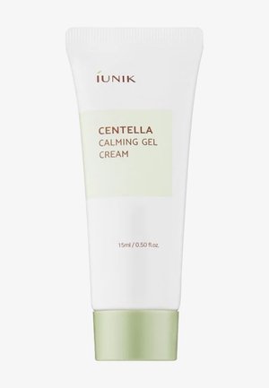 Tube blanc de crème gel apaisante Iunik Centella avec bouchon vert clair, étiquetée 15 ml 0,50 fl. oz, pour soin de la peau.