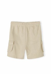 Shorts en coton beige avec ceinture élastique et poches à rabat des deux côtés, présentés à plat sur fond blanc.