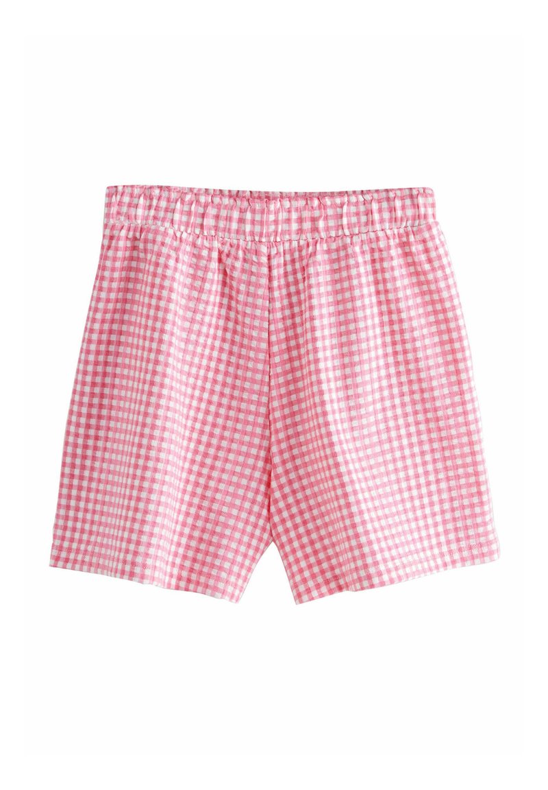 Shorts en vichy rose avec une taille élastique, présentant un motif à carreaux avec des carrés blancs, fabriqués en tissu léger.