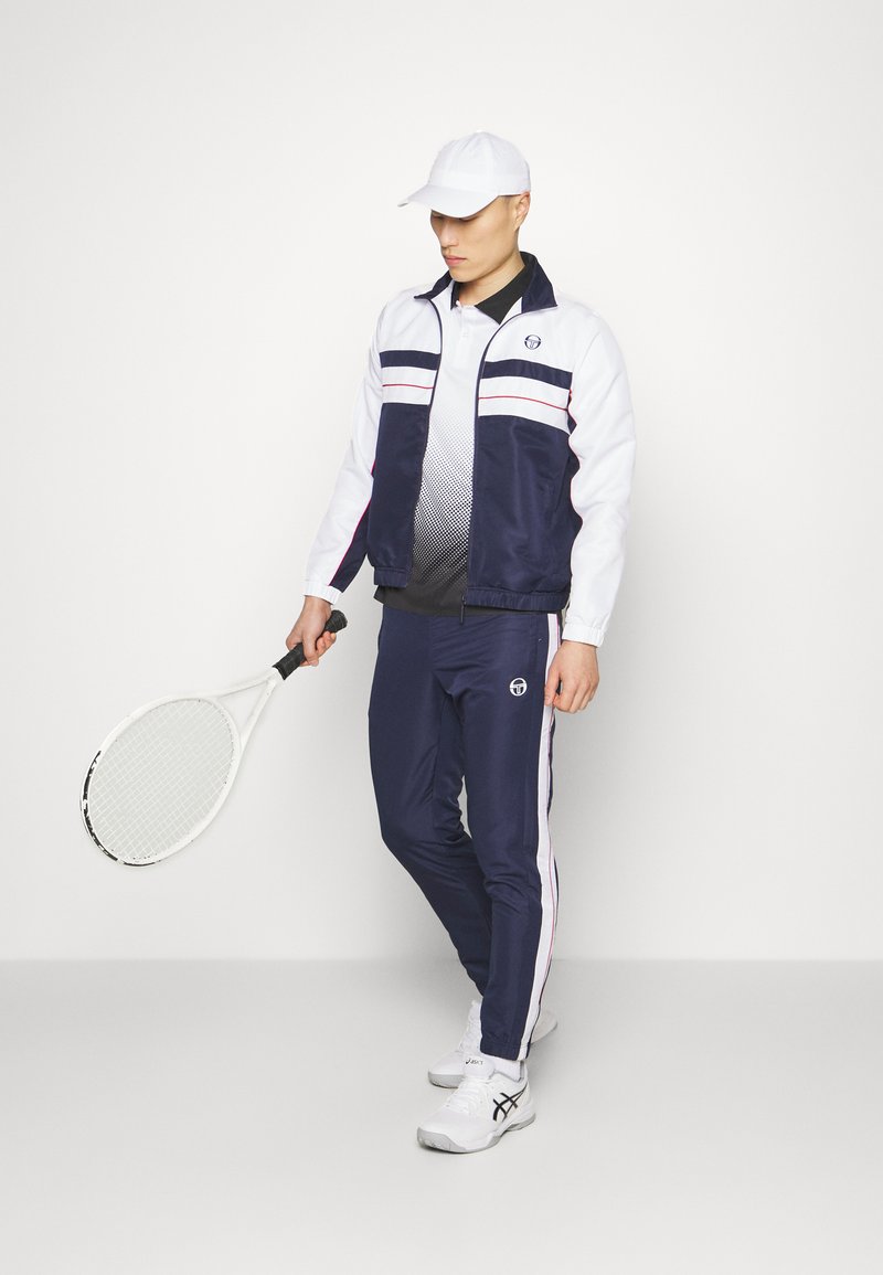 Sergio Tacchini - ZELMA TRACKSUIT - Trainingsanzug - navy/white/adrenaline rush, Vergrößern