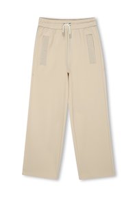 Beige wijde broek gemaakt van zacht materiaal, met een elastische tailleband met trekkoord en DKNY-logo accenten op de voorzakken.