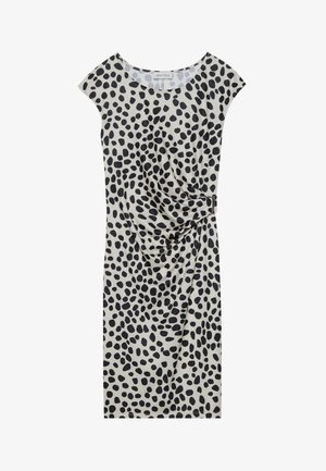 Knee-length dress in light beige with a black spotted pattern, featuring short cap sleeves and a side draping detail secured with a metallic accent.