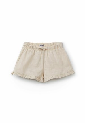 Shorts légers couleur crème avec ourlets à volants, taille élastique et petit détail nœud papillon à l'avant.