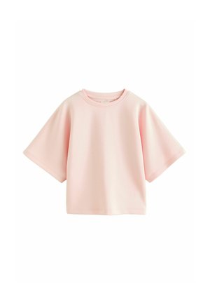 Blød pink oversized kortærmet skjorte med rund halsudskæring og afslappet pasform, vist på hvid baggrund.