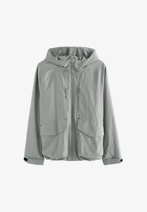 Giubbotto grigio chiaro con cappuccio, zip frontale, due ampie tasche e polsi elasticizzati. Realizzato in materiale liscio e leggero.