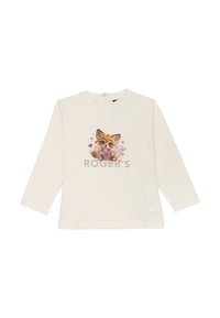 Maglietta a maniche lunghe color crema chiara con una grafica di una volpe che tiene un cuore, con il testo "ROGER'S" sottostante in grigio metallico.