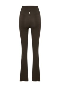 Ciemnobrązowe leginsy dzwony z wysokim stanem. Posiadają teksturowane wykończenie oraz trzy poziome akcentujące linie z tyłu.