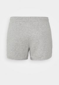 Harmaat puuvillashortsit, joissa on joustava vyötärö, yksinkertainen muotoilu ja ei näkyviä logoja tai koristeita. Hiukan harjattu pintakuvio.