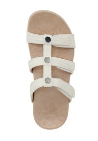 White slide sandal with three fabric straps, adjustable with silver hardware. Soft, textured footbed with circular grip pattern.