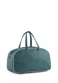 Turkisfarvet duffelbag med hvide kanter og dobbelte håndtag, stående oprejst på en hvid baggrund.