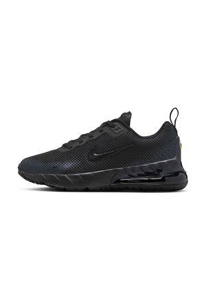 Baskets de sport noires avec une tige en maille dotée de détails perforés, semelle en caoutchouc et une unité de coussin d'air visible au niveau du talon.