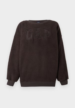 Dark brown fleece sweatshirt with a textured surface, round neck, and ribbed cuffs. Features a raised "GAP" logo on the front.