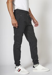 Koroshi JOGGING - Trainingsbroek - black