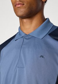 J.LINDEBERG Sports LEGACY - Polokošeľa - vintage indigo