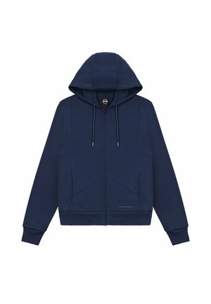 Tengerészkék cipzáros pulóver húzózsinórokkal, elülső zsebekkel, bordázott mandzsettákkal és kis logóval a derékrész közelében, fehér háttéren.