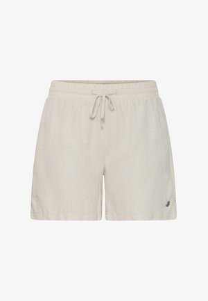 Beežid vabaajapüksid elastse vöö ja nöörkinnitusega, alumisel vasakul säärel väike tume logo.