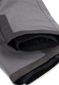 Grijze high-performance broek met een gladde textuur, elastische tailleband en zwarte binnenvoering. Bevat versterkte naden en een slank ontwerp.