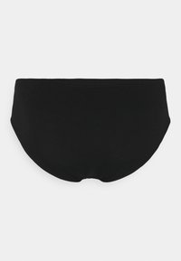Slip bikini in cotone nero con una texture liscia, vita elastica e un design semplice. Nessun motivo visibile o accessori.
