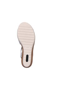 Semelle de chaussure avec une base en caoutchouc blanc, des lignes de texture et un accent en liège beige. Présente un logo noir sur la surface de la semelle.