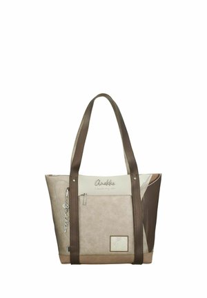Sac cabas beige et marron avec poche zippée à l'avant, longues anses, breloque logo en métal décorative et nom de la marque "Anekke" cousu sur le dessus à l'avant.