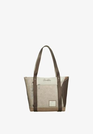 Sac cabas beige et marron avec poche zippée à l'avant, longues anses, breloque logo en métal décorative et nom de la marque "Anekke" cousu sur le dessus à l'avant.