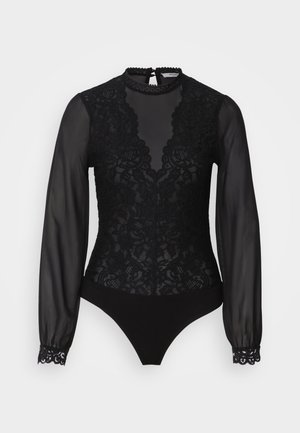 Sort bodysuit med en gennemsigtig, langærmet blondefront, høj hals og bølgede kanter. Glat stof i bunden for en tætsiddende pasform.