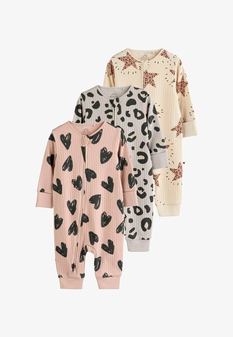 Three children's rompers: pink with black hearts, light gray with black leopard spots, and cream with pink stars. Soft ribbed fabric, long sleeves.