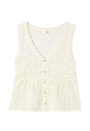 Blouse sans manches en dentelle blanche avec bords festonnés, boutonnage sur le devant, motif floral subtil, et détail de taille froncée.