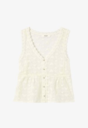 Blouse sans manches en dentelle blanche avec bords festonnés, boutonnage sur le devant, motif floral subtil, et détail de taille froncée.