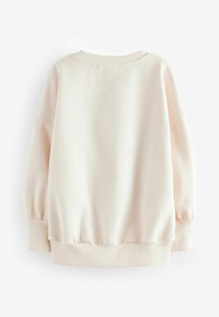 Lyserød sweatshirt med rund udskæring, sænket skuldre og ribstrikkede manchetter og kant. Glat tekstur, afslappet pasform.