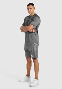 Smilodox POWERFIT TRIPLE PERFORMANCE - T-shirt till träning - anthrazit