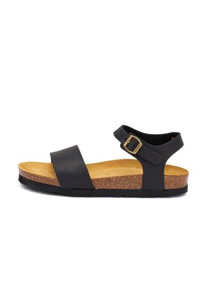 Sandalia negra de punta abierta con plantilla de corcho, correa ajustable en el tobillo con hebilla dorada y suela de goma negra.