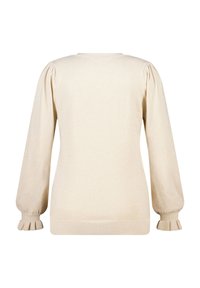 Beige pullovertrui met lange, pofmouwen. Voorzien van geribbelde manchetten met ruches, een ronde halslijn en een zacht, gestructureerd gebreid materiaal.