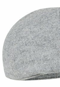 Flat cap made of textured gray fabric. Rounded shape with minimal stitching details, showcasing a subtle pattern in the material.