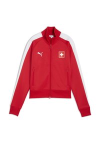 Punane spordijakk valgete detailidega, lukuga ees, kõrge kraega, kahe küljetaskuga, millel on Šveitsi lipu embleem ja Puma logo rinnal.