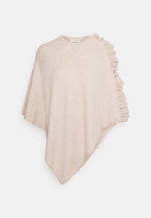 Helle beigefarbene Poncho aus weichem, strukturiertem Stoff mit rüschierten Akzenten auf der rechten Seite. Rundhalsausschnitt, lockere Passform und asymmetrischer Saum.