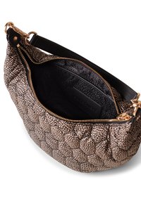 Textured black and beige handbag with a golden zipper, featuring a soft, quilted exterior and smooth black lining inside.