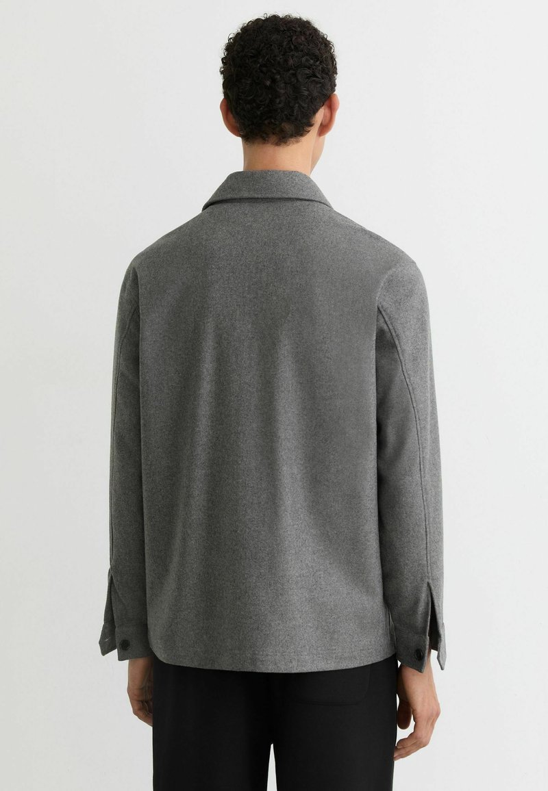 Pull ample col tunisien uni en laine mélangée Alabama Gris chine Des