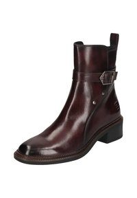 Braune Leder-Stiefelette mit glatter Oberfläche, runder Zehenpartie, niedrigem Blockabsatz, dekorativem Riemen mit Schnalle und metallischen Akzenten.