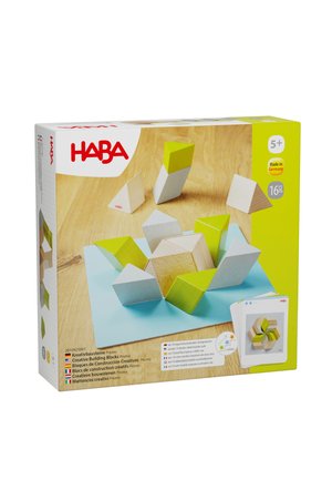 HABA creative building blocks set with 16 wooden geometric shapes in green, white, and natural wood colors, for ages 5 and up.