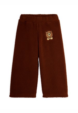 Brown fleece pants with a soft, textured surface. Features an embroidered bear motif on the front. Elastic waistband for comfort.