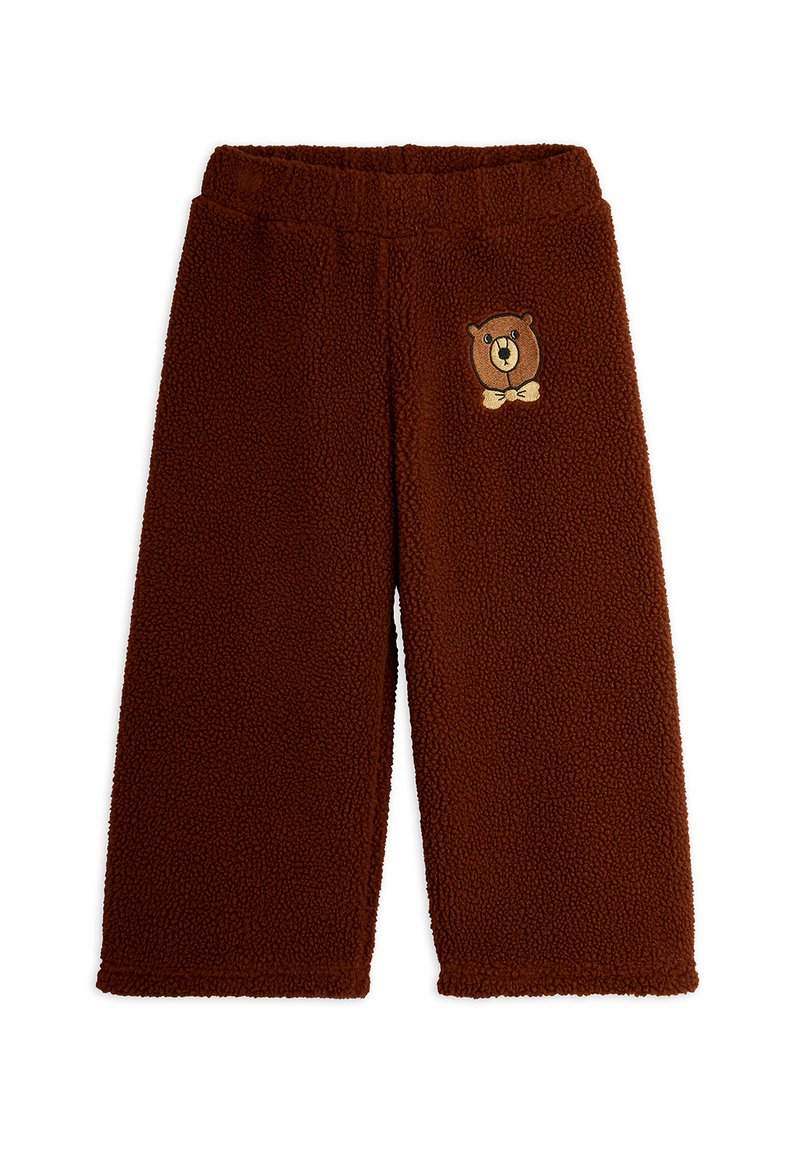 Calças de flanela castanhas com uma superfície suave e texturada. Apresentam um motivo de urso bordado na frente. Cintura elástica para maior conforto.