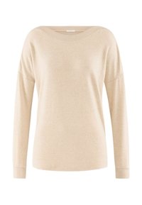 Beige stickad tröja med vid halsringning, l�ånga ärmar och ribbade muddar och nederkant. Mjuk textur, avslappnad passform, minimalistisk design.