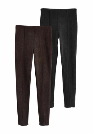 Paar Leggings in Dunkelbraun und Schwarz. Mit geripptem Muster und vertikalen Nähten. Enganliegende Silhouette mit einem elastischen Bund.