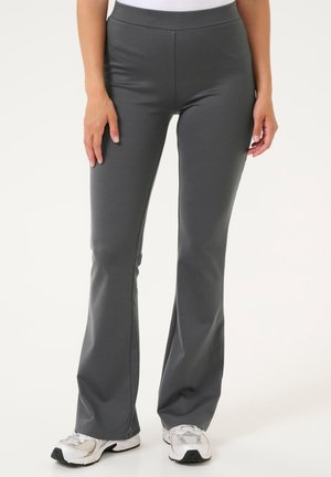 Graue ausgestellte Hose aus weichem, dehnbarem Stoff mit glatter Textur, mit hohem Bund und ohne sichtbare Muster oder Beschläge.