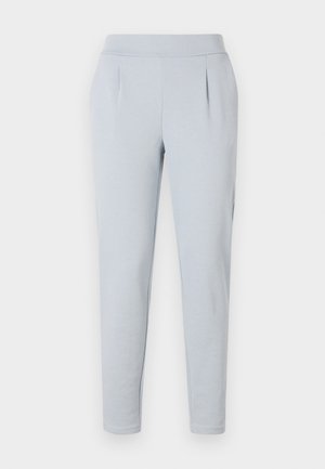 Light blue tapered pants made from a soft fabric, featuring a flat waistband and two side pleats for added style and structure.